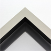 This large, L-shaped floating contemporary canvas frame in warm silver features a wide flat face.

*Note: These solid wood, custom canvas floaters are for stretched canvas prints and paintings, and raised wood panels.
